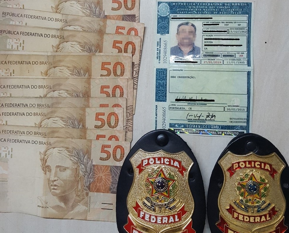 Homem foi preso com documento falso e dinheiro sacado de forma irregular em banco de Mossoró, RN (Foto: PF/Divulgação)