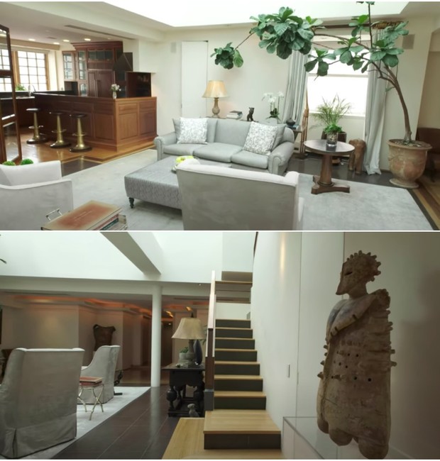 É também nesse ambiente central do apartamento que fica a escada de acesso aos andares superiores (Foto: Reprodução / Youtube)