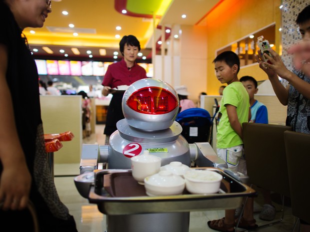 Cada robô custa a Song cerca 4.000 yuanes (6.500 dólares) (Foto: AFP)