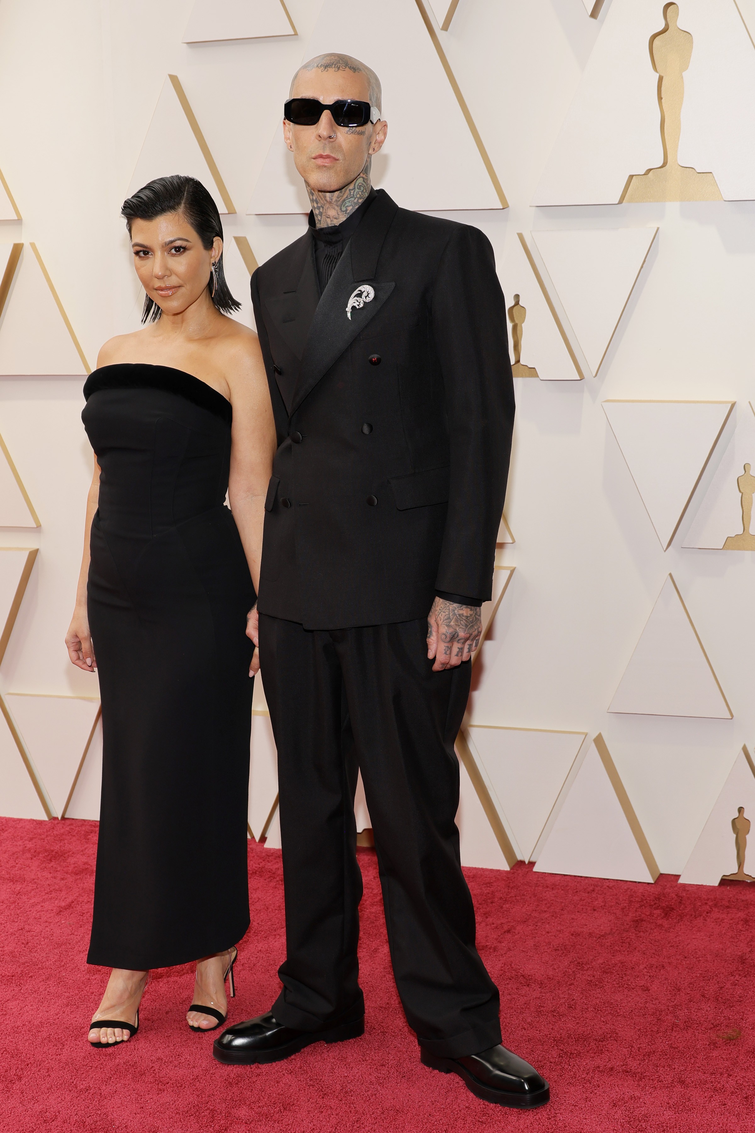 HOLLYWOOD, CALIFORNIA - MARCH 27: (L-R) Kourtney Kardashian and Travis Barker attend the 94th Annual Academy Awards at Hollywood and Highland on March 27, 2022 in Hollywood, California. (Photo by Mike Coppola/Getty Images) (Foto: Getty Images)
