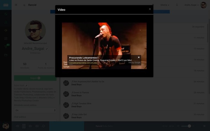 Além de comprar músicas o usuário pode ver a letra das músicas ou ver vídeos em tela cheia (Foto: Reprodução/André Sugai)