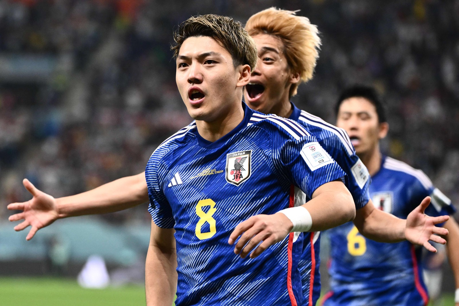 Ritsu Doan comemora o primeiro gol do Japão — Foto: Jewel SAMAD / AFP
