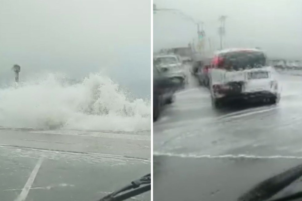 Por conta de ressaca, água do mar chega até carros em avenida na Ponta da Praia, em Santos (SP) — Foto: Reprodução