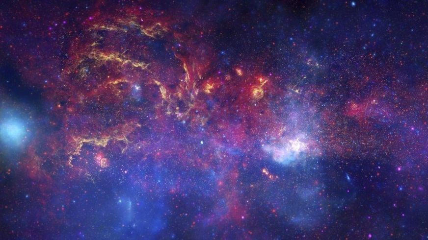 O Universo que podemos ver atualmente é composto de aglomerados de partículas, poeira, estrelas, buracos negros, galáxias e radiação (Foto: NASA/JPL-CALTECH/ESA/CXC/STSCI, via BBC News Brasil)