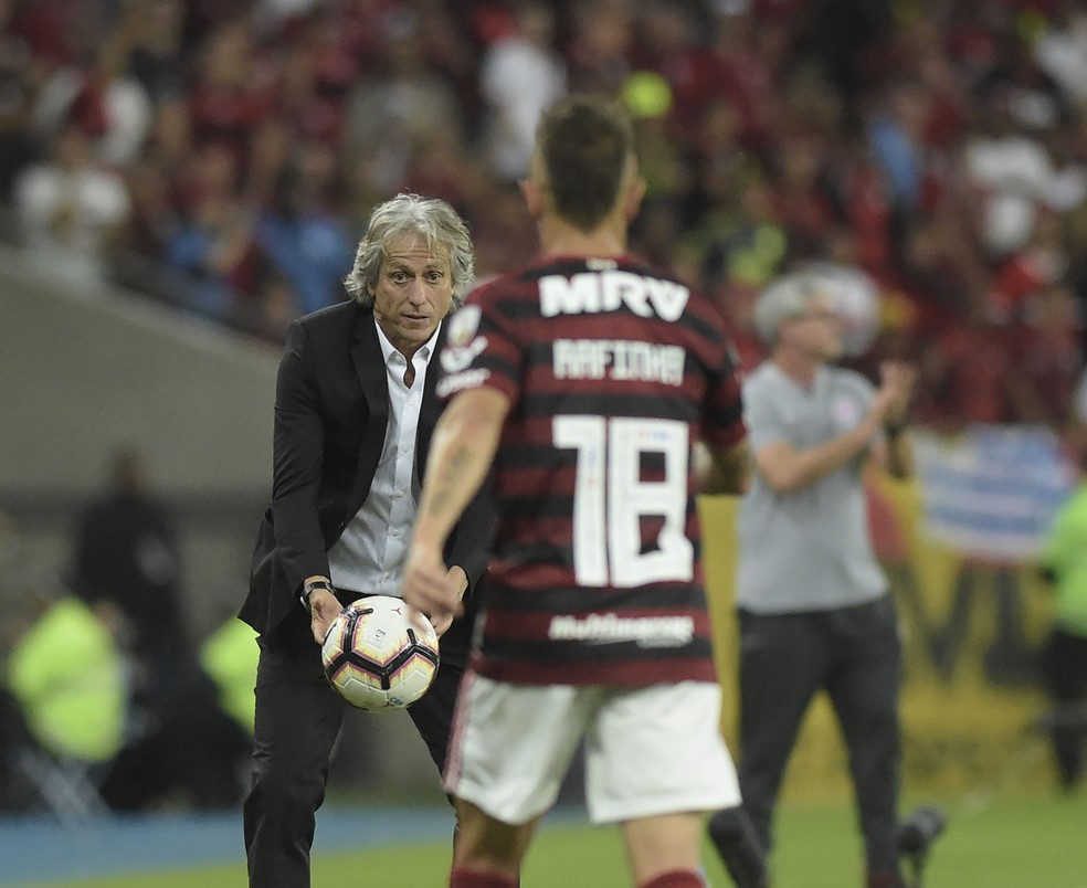 Jorge Jesus e Rafinha em ação pelo Flamengo — Foto: André Durão