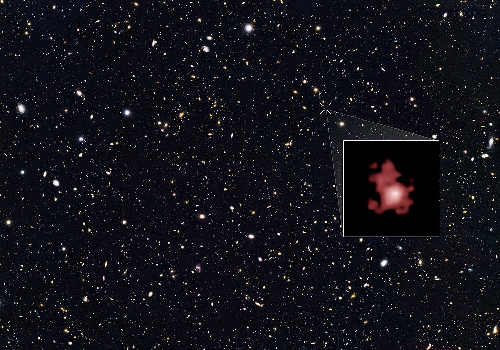 Galáxia GN-z11, que está a 32 bilhões de anos-luz de distância, nasceu há 13,8 bilhões de anos, bem no início do Universo. (Foto: NASA, ESA, P. Oesch (Yale University), G. Brammer (STScI), P. van Dokkum (Yale University), and G. Illingworth (University of California, Santa Cruz))
