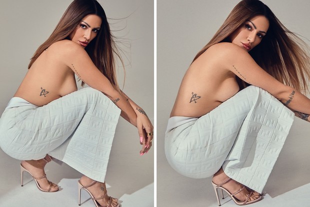 Cleo posa só de calça e deixa tatuagem à mostra (Foto: Léo Fagherazzi/Reprodução/Instagram)