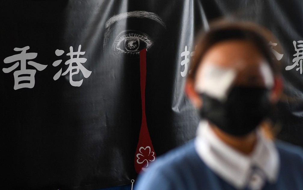 Os manifestantes acusam a polícia de usar de excesso de força — Foto: Manan Vatsyayana/AFP