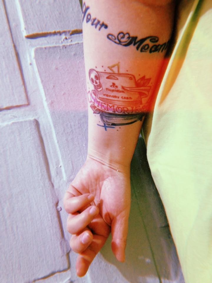 tatuagem do leitor (Foto: Arquivo pessoal/ Erika Sansei)