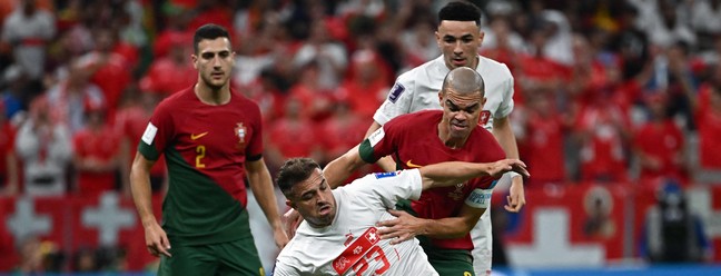 Portugal e Suíça se enfrentam no Estádio Lusail, ao norte de Doha, em 6 de dezembro de 2022.  — Foto: Anne-Christine POUJOULAT / AFP