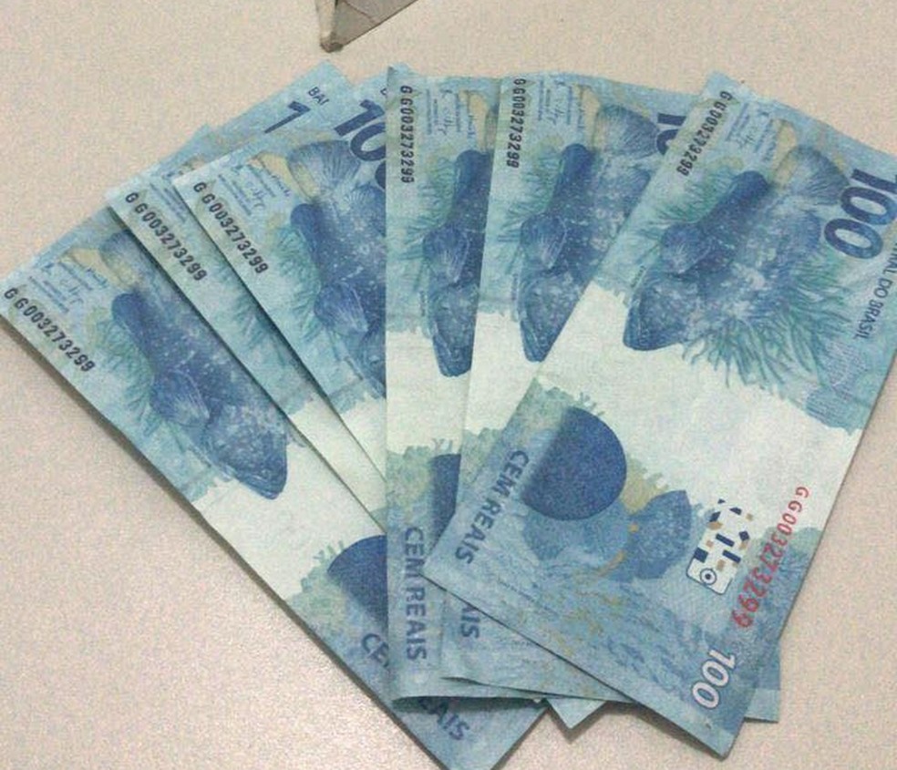 Casal é preso com notas de R$ 100 falsas em Moema | Centro-Oeste | G1