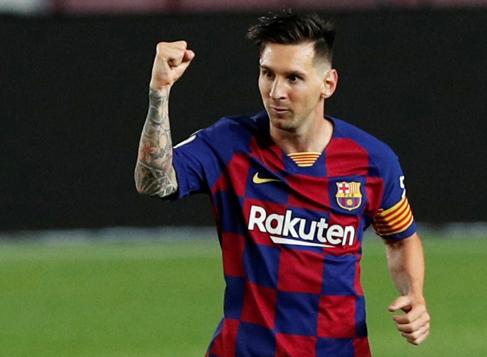 Messi vibra com o seu gol 700: marca histórica, mas Barcelona coleciona resultados ruins e vê Real Madrid mais perto do título espanhol — Foto: Albert Gea/Reuters