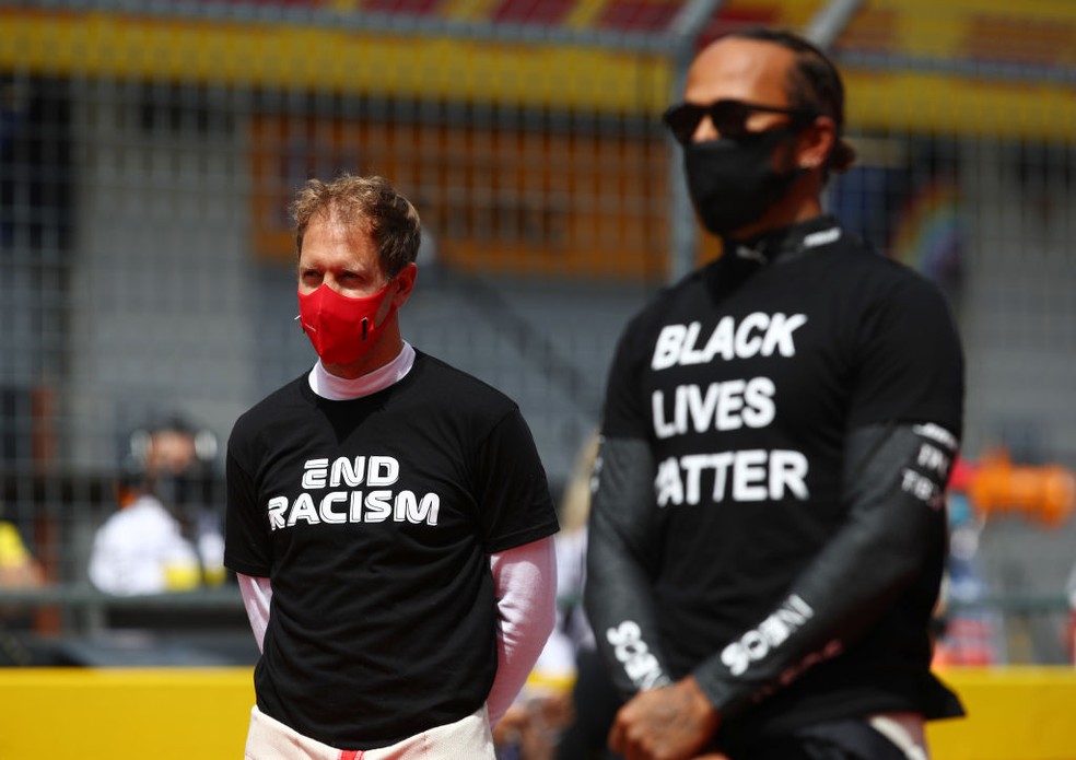 Vettel e Hamilton se manifestam contra casos de racismo e pedem por igualdade de gênero no esporte — Foto: Getty