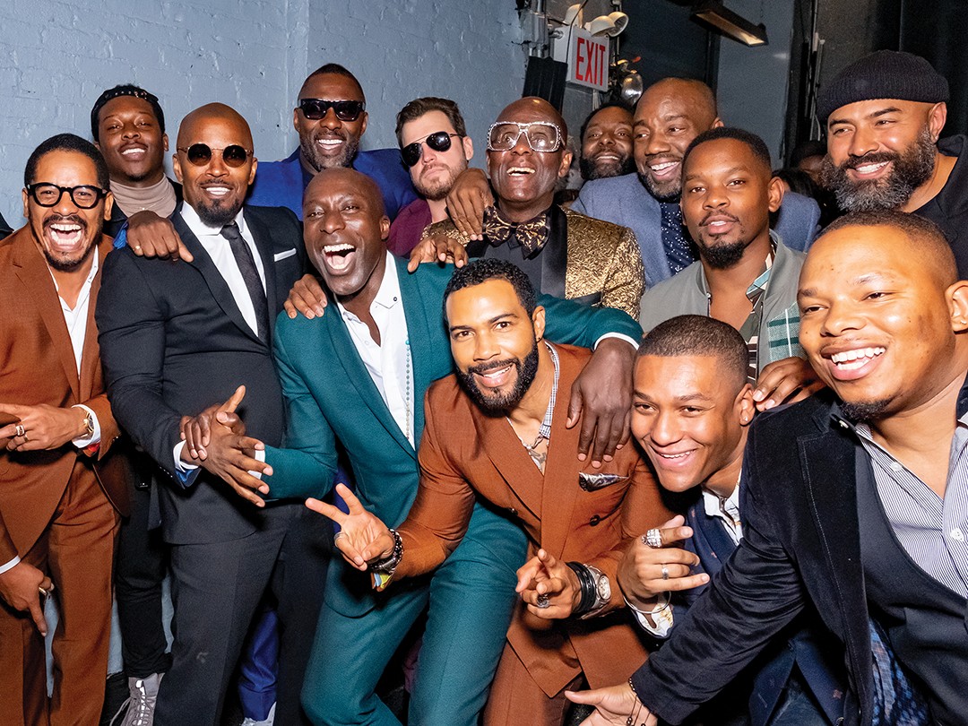 O mago do terno: Boateng com amigos no desfile do Harlem. Entre eles, Roman Marley, Jamie Foxx, Idris Elba, Dapper Dan e Omari Hardwick. (Foto: divulgação)