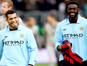 Tevez com Kolo Toure no Manchester City (Foto: Getty Images)