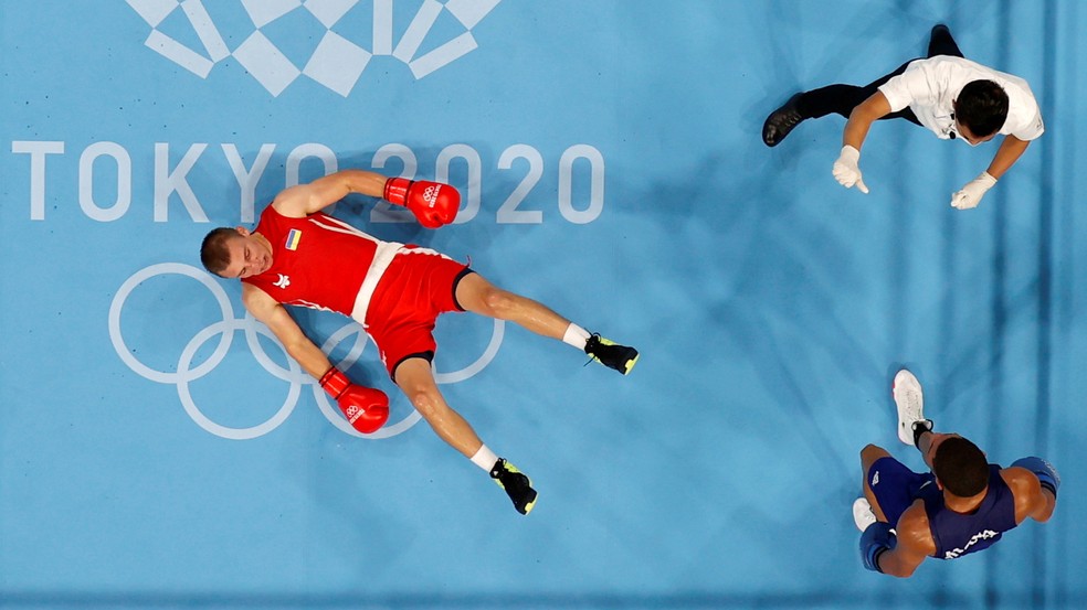 Hebert Conceicção nocauteia o ucraniano é campeão olímpico — Foto: Ueslei Marcelino/Reuters