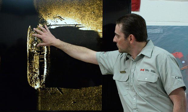 Researcher Ryan Harris explains the ship's discovery during a presentation (Photo: AP Photo/The Canadian Press, Sean Kilpatrick)