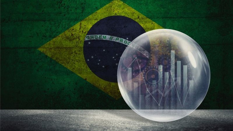 Segundo novo relatório do fundo, economia brasileira crescerá 5,2% neste ano, ante estimativa anterior de 5,3% (Foto: GETTY IMAGES)