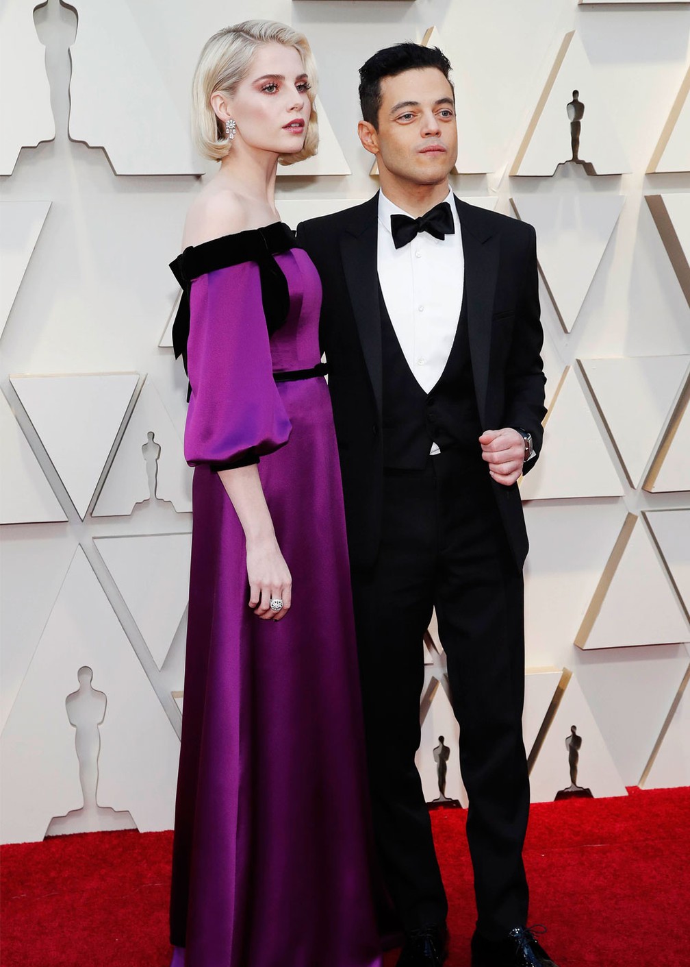 O ator Rami Malek e Lucy Boynton no tapete vermelho do Oscar 2019 â€” Foto: Mario Anzuoni/Reuters