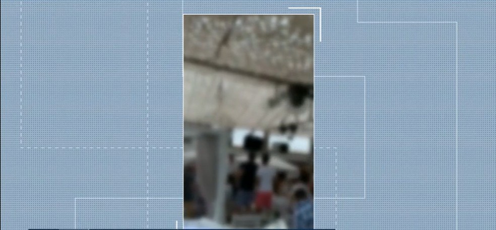 Guarda Municipal analisa as imagens e denúncias que mostram um evento em beach club em Jurerê Internacional,em Florianópolis — Foto: Reprodução/ NSC TV