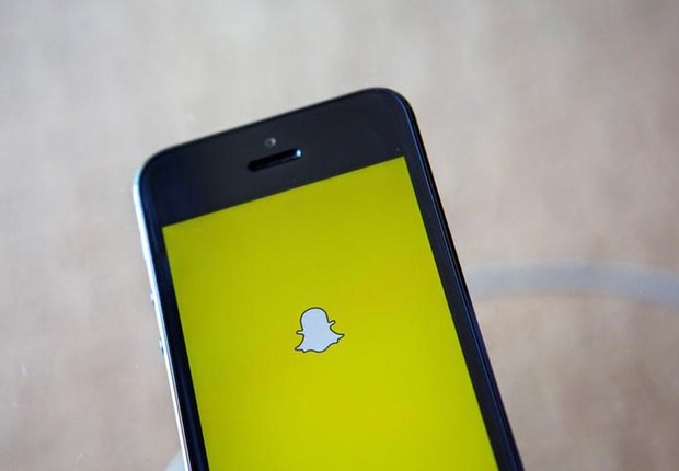 Aplicativo Snapchat é iniciado em celular (Foto: Eric Thayer/Arquivo/Reuters)