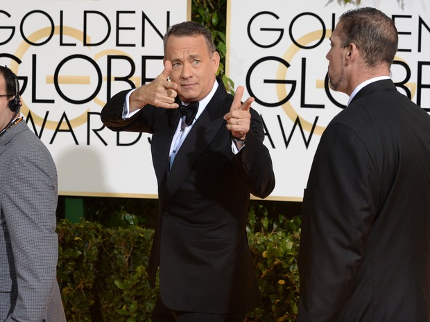 O ator Tom Hanks no tapete vermelho do 71º Globo de Ouro, que acontece neste domingo (12), em Los Angeles. (Foto: Jordan Strauss/Invision/AP)