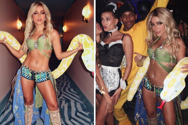 Anitta, fantasiada de Britney Spears,posa com amigos em festa, entre eles Hailey Bieber  (vestida de camareira) (Foto: Reprodução/Instagram  )