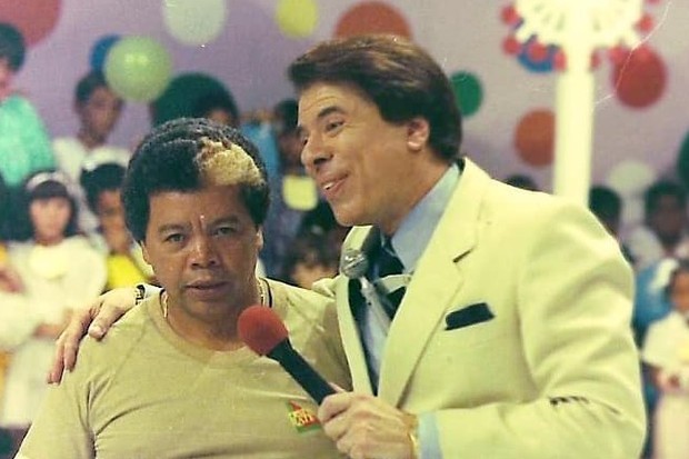 Silvio Santos e  Roque, seu fiel escudeiro, durante gravação do Topa Tudo por Dinheiro (Foto: Divulgação/SBT)