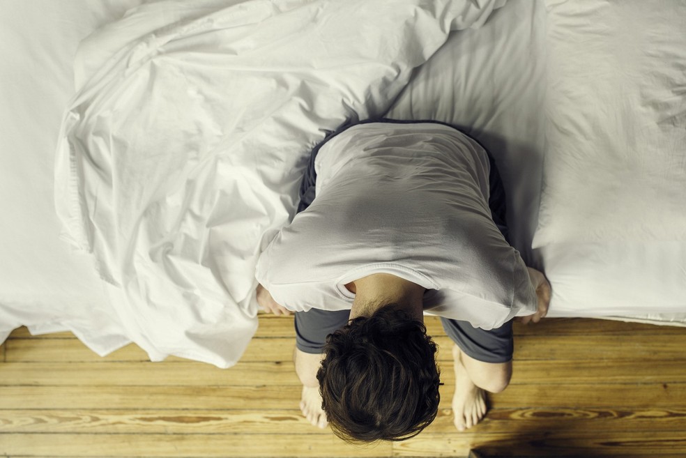 Chamada clinicamente de depressão atípica, ela é difícil de identificar exatamente porque os sintomas estão frequentemente mascarados por falsas demonstrações de felicidade. — Foto: Frédéric Cirou/AltoPress/PhotoAlto/AFP/Arquivo