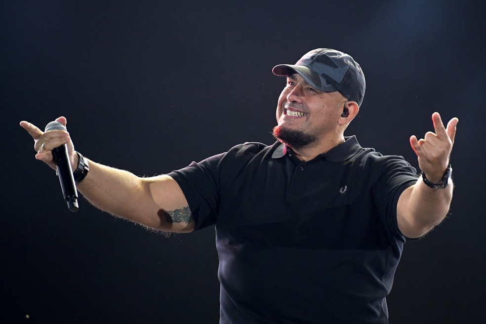 Digão, vocalista do Raimundos, durante show no palco Mundo do Rock in Rio 2019 — Foto: Alexandre Durão/G1