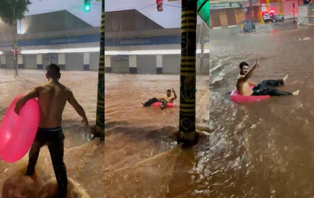 Jovem usa boia para 'brincar' na enxurrada durante temporal em Itapeva (SP) — Foto: Thiago Leitão/ Reprodução 