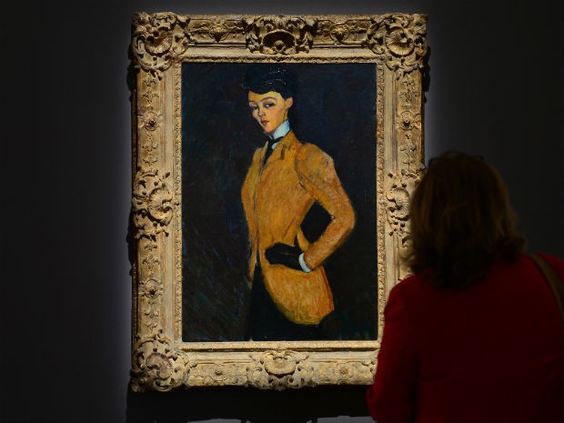 Retrato 'L'Amazone', de Modigliani,  foi leiloado por US$ 25,9 milhões (Foto: Emmanuel Dunand/ AFP)