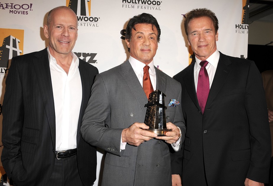 Bruce Willis, Sylvester Stallone e Arnold Schwarzenegger em registro feito em 2010