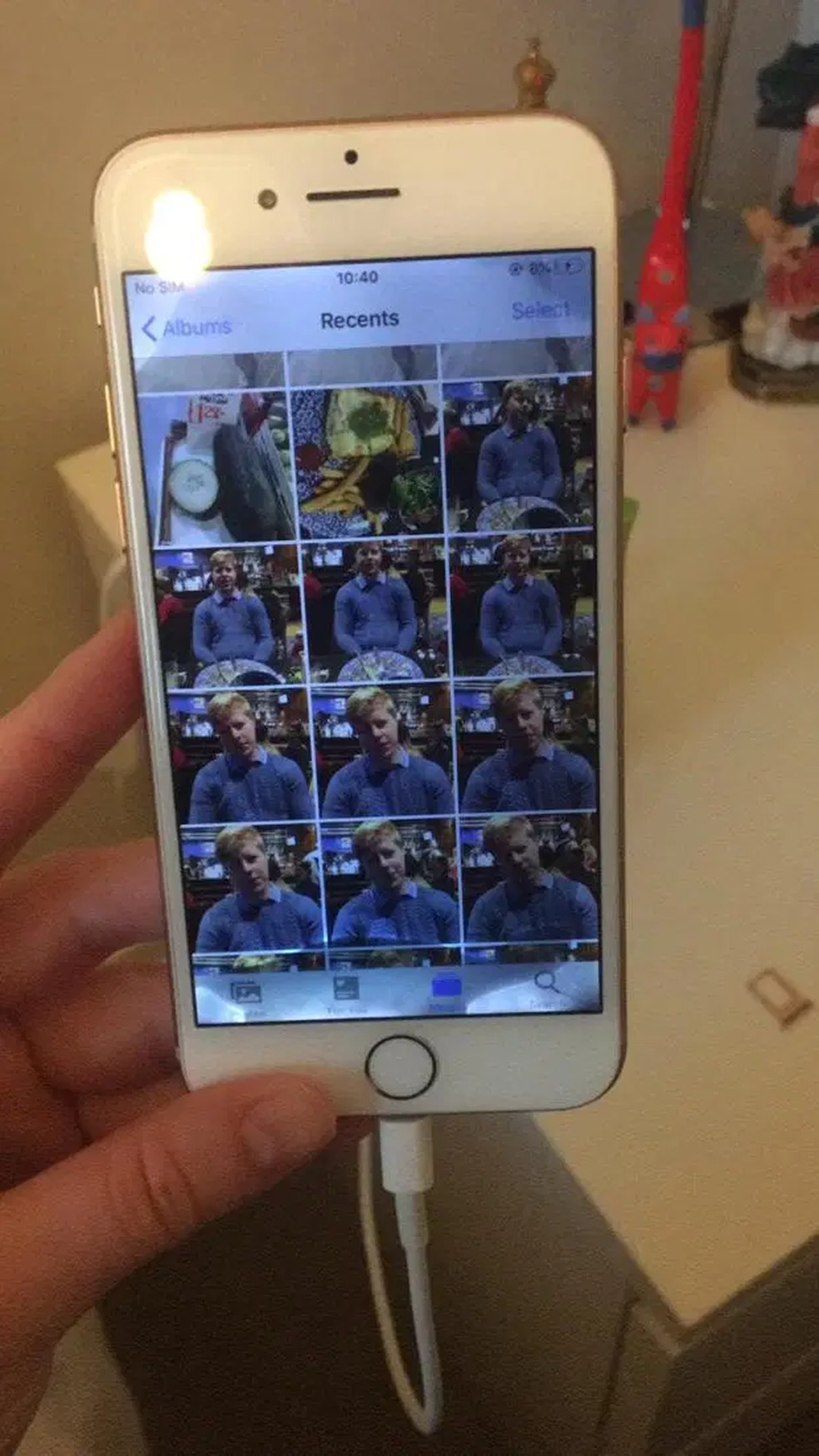 O iPhone 8 recuperado ainda continha as mais de 20 mil fotos do casal — Foto: Reprodução/The Sun