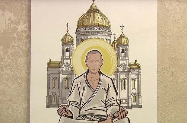 Putin também é sobreposto à imagem do líder pacifista Mahatma Gandhi (Foto: Reprodução/ RT)