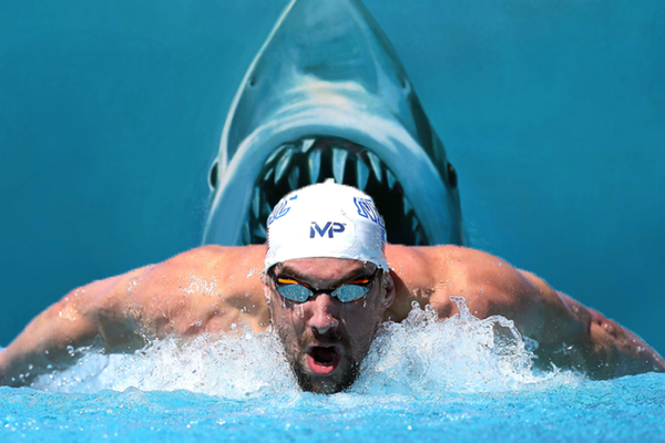 Montagem com o campeão Michael Phelps e cartaz do filme 'Tubarão' (Foto: Getty Images/Divulgação)