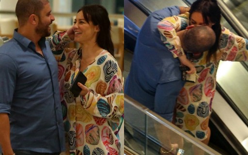 Paolla Oliveira e Diogo Nogueira trocam beijos durante passeio em shopping no Rio