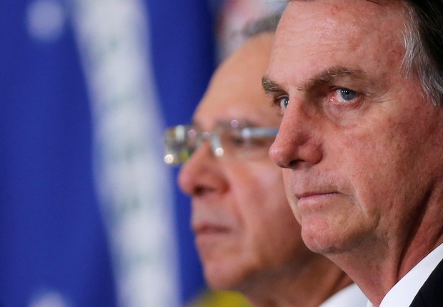 Presidente Bolsonaro e ministro Paulo Guedes durante evento no Planalto (Foto: REUTERS/Adriano Machado)