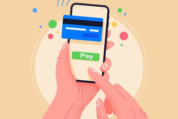 Use phone when shopping. Pay by credit card via electronic wallet wirelessly on phone. New mobile banking app and e-payment vector illustration. Hand with smartphone  online banking. Shopping by phone and connected card. (Foto: Getty Images/iStockphoto)