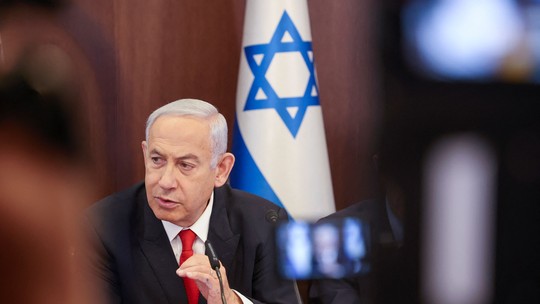 Parlamento de Israel aprova lei que protege Netanyahu de ser retirado do cargo, em meio a protestos  