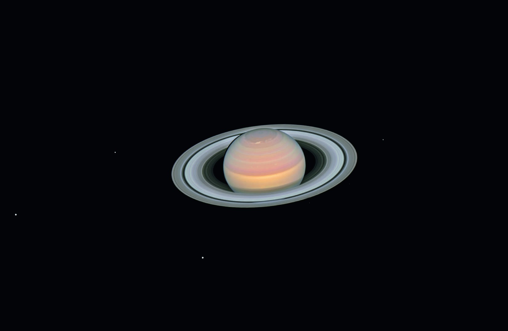 Saturno e algumas de suas luas (Foto: ESA/Hubble)