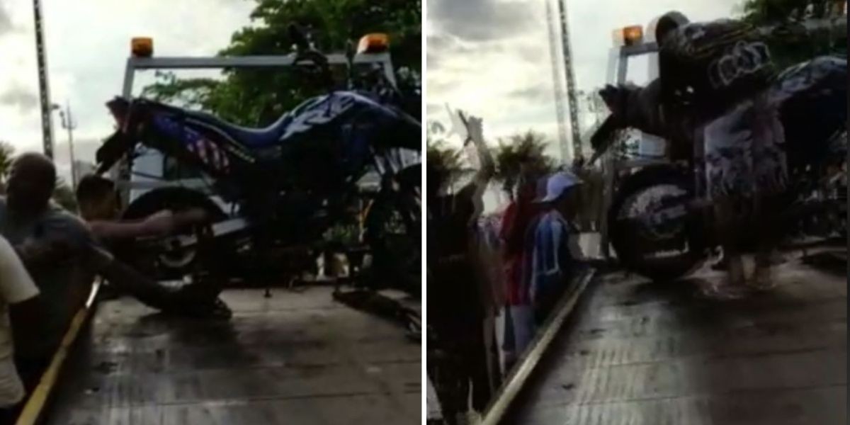 Banhistas se revoltam com agentes de trânsito e tentam retirar moto de guincho no litoral de SP; VÍDEO