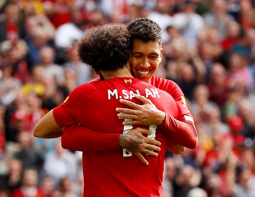 Firmino e Salah celebram gol do Liverpool â Foto: Reuters