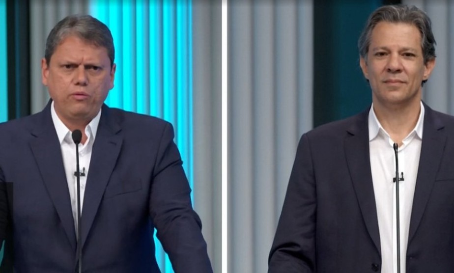 Tarcísio de Freitas (Republicanos) e Fernando Haddad (PT) no debate da TV Globo do primeiro turno entre candidatos ao governo de SP