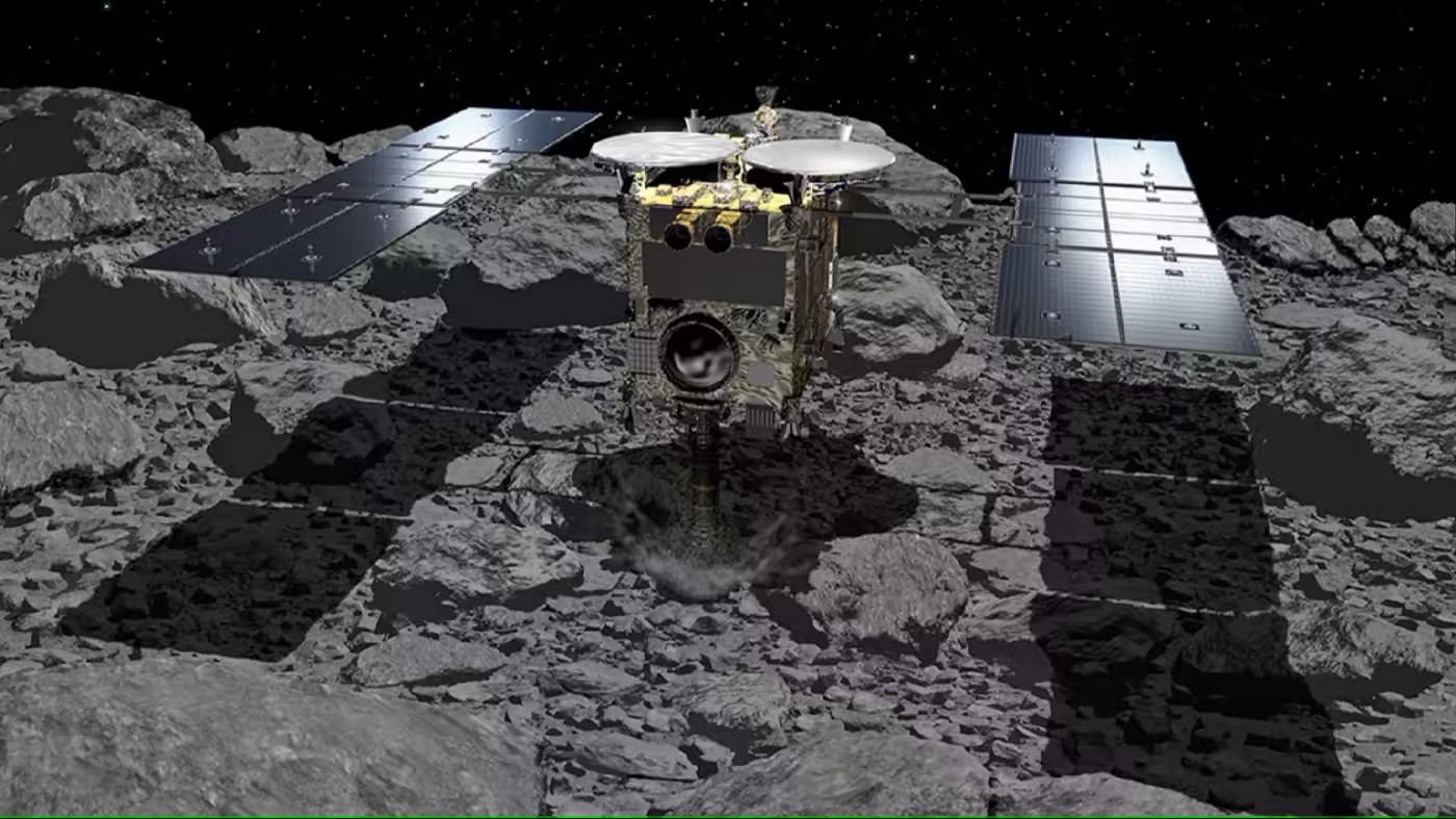 Sonda espacial Hayabusa2 sobre asteroide em representação artística (Foto: JAXA)