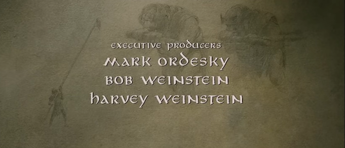 Os dois trolls alimentados por um orc no trecho dos créditos de Senhor dos Anéis: A Sociedade do Anel (2001) com os nomes dos irmão Bob e Harvey Weinstein (Foto: Reprodução)