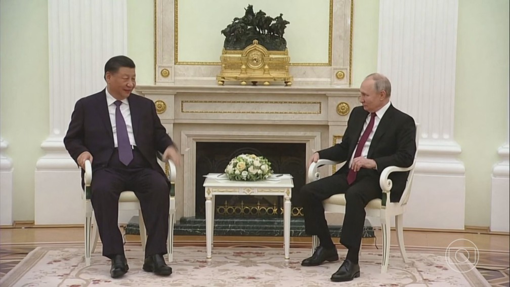 Xi Jinping e Vladimir Putin — Foto: JN