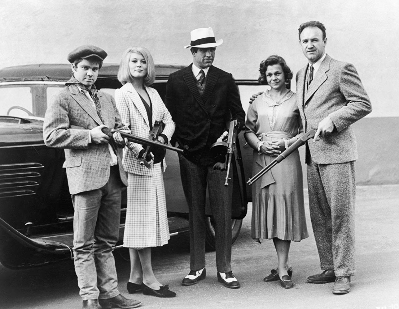 Michael J. Pollard em 'Bonnie & Clyde' (1967) - o ator é o último da direita (Foto: Divulgação)