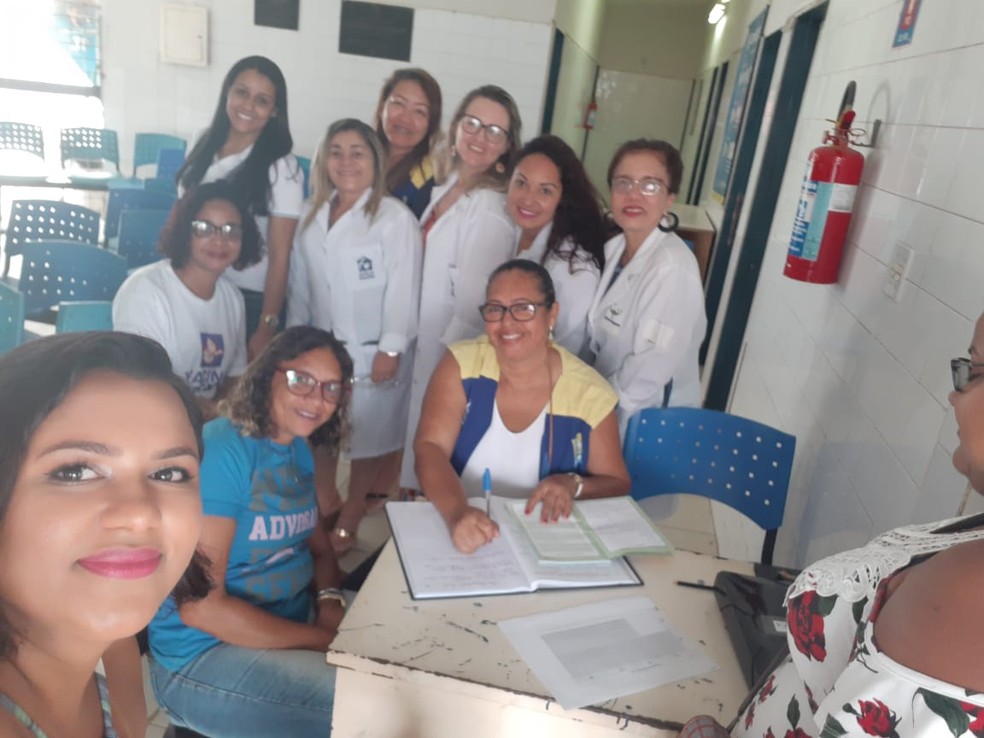 Rozangela Silva (no centro) é agente de saúde há quase 20 anos — Foto: Acervo pessoal