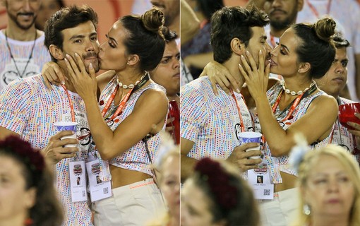 Carla Prata e Mariano trocam beijos na Sapucaí